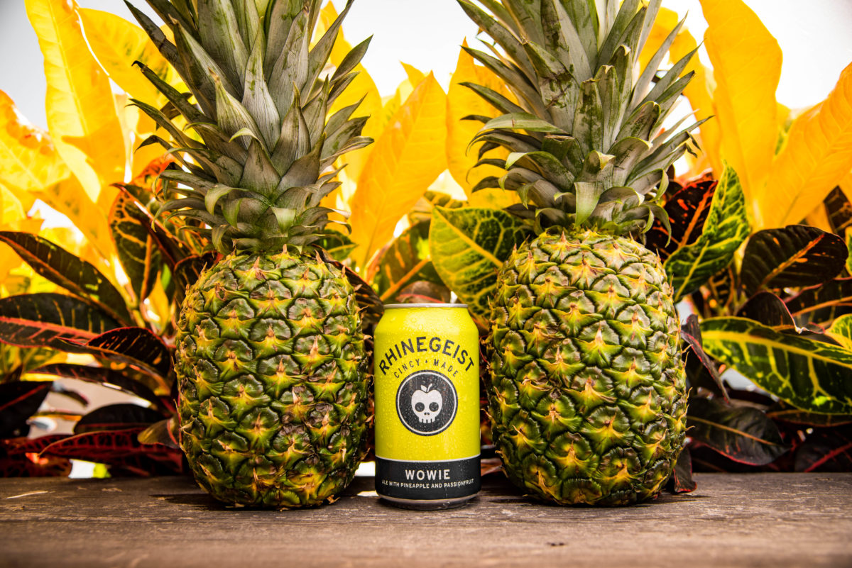 can of beer between two pineapples