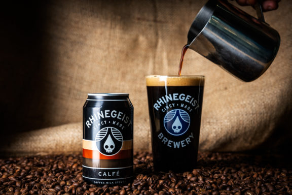 Showing Rhinegeist Calfé can and full pint glass