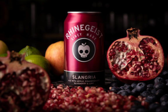 Can of Rhinegeist Slangria surrounded by fruit