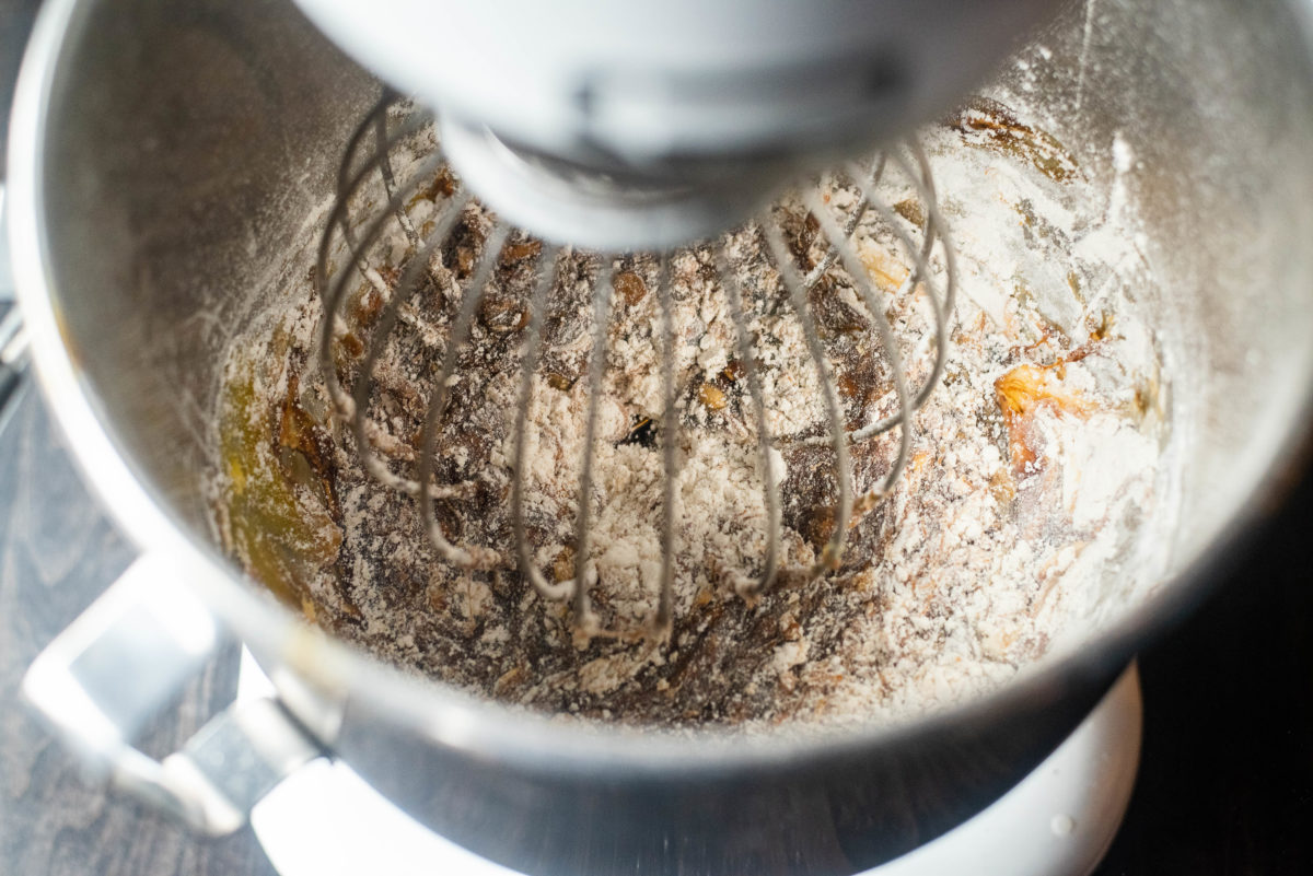 all cake batter ingredients in mixing bowl